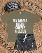 Children's outfit with t-shirt, shorts, and cap on a textured surface